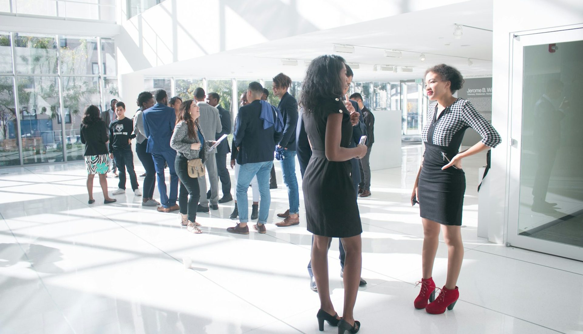 Professionals networking at an event